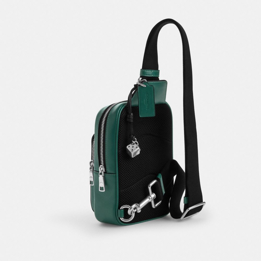 Coach Racer Sling Pack In Signature Canvas With Charms Silver Sea Green