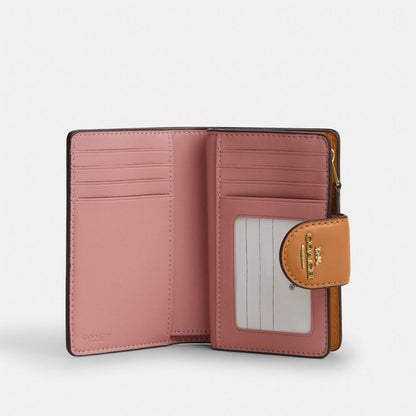 Coach Medium Corner Zip Wallet In Signature Canvas Gold Powder Pink