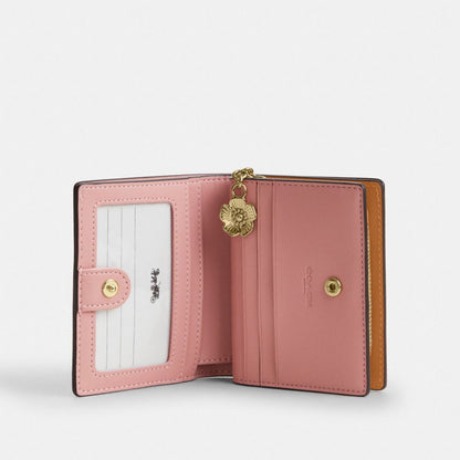 Coach Snap Wallet In Signature Canvas With Charm Gold Powder Pink