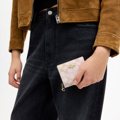 Coach Snap Wallet In Signature Canvas Gold Chalk Pink