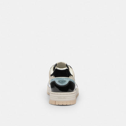 Women's Coach Soho Sneaker With Patent Signature Sea Mist Black.