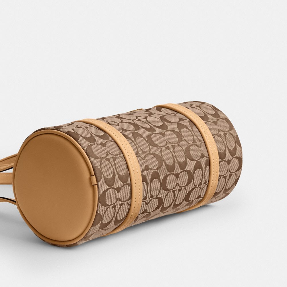Coach Kisslock Barrel Bag 28 In Signature Jacquard Brass/Khaki Light Peach