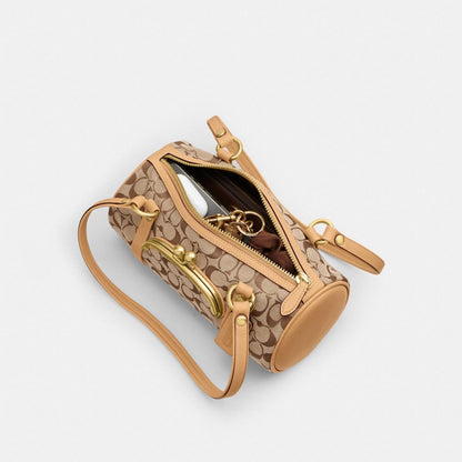 Coach Kisslock Barrel Bag 28 In Signature Jacquard Brass/Khaki Light Peach