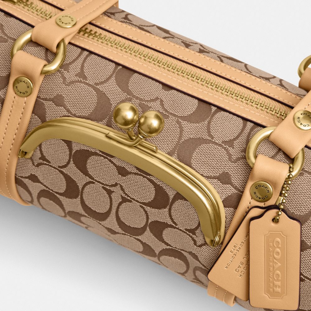 Coach Kisslock Barrel Bag 28 In Signature Jacquard Brass/Khaki Light Peach