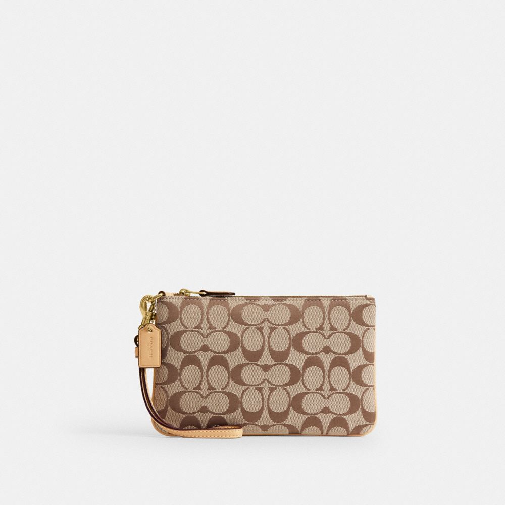 Coach Essential Small Wristlet In Signature Jacquard Brass Khaki Light Peach