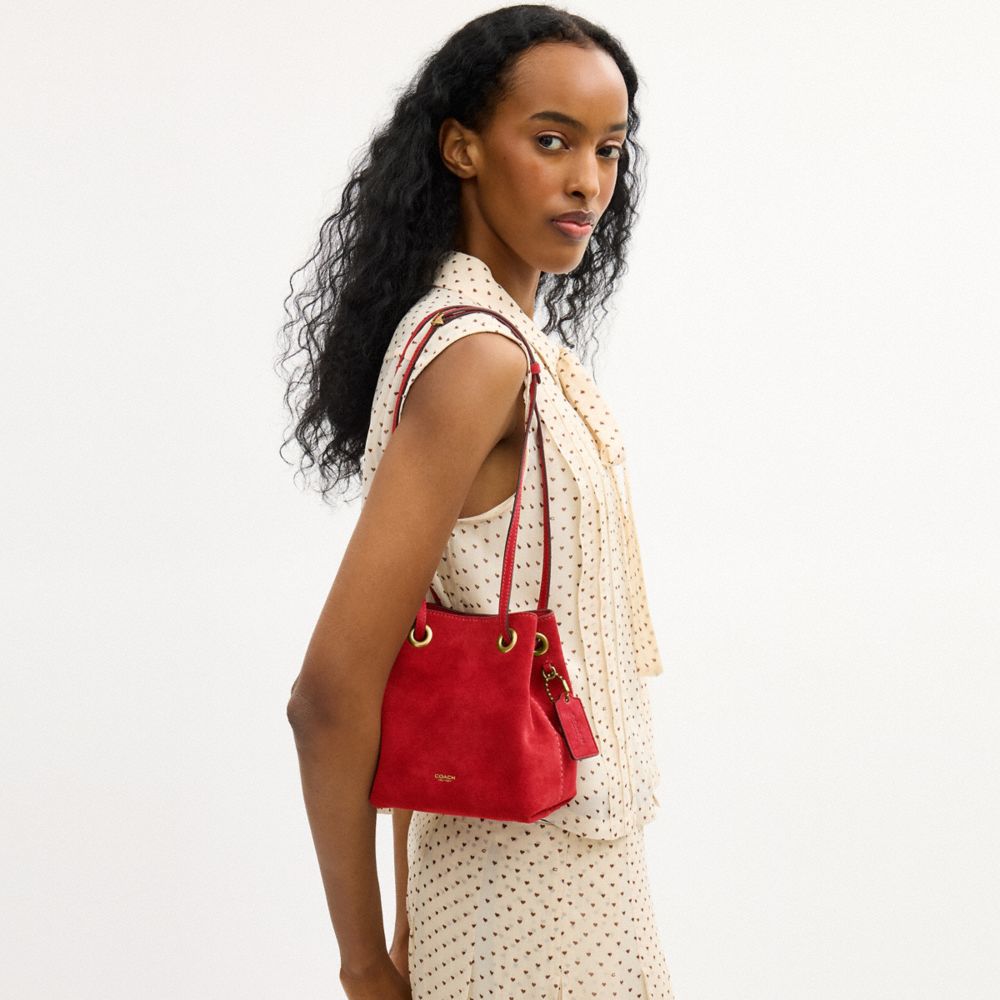Coach Jade Drawstring Bag Brass/Candy Apple