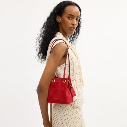 Coach Jade Drawstring Bag Brass/Candy Apple