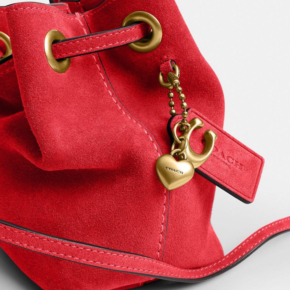 Coach Jade Drawstring Bag Brass/Candy Apple