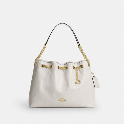 Coach Evelyn Shoulder Bag With Quilting And Charm Gold Chalk