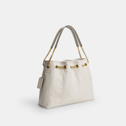 Coach Evelyn Shoulder Bag With Quilting And Charm Gold Chalk