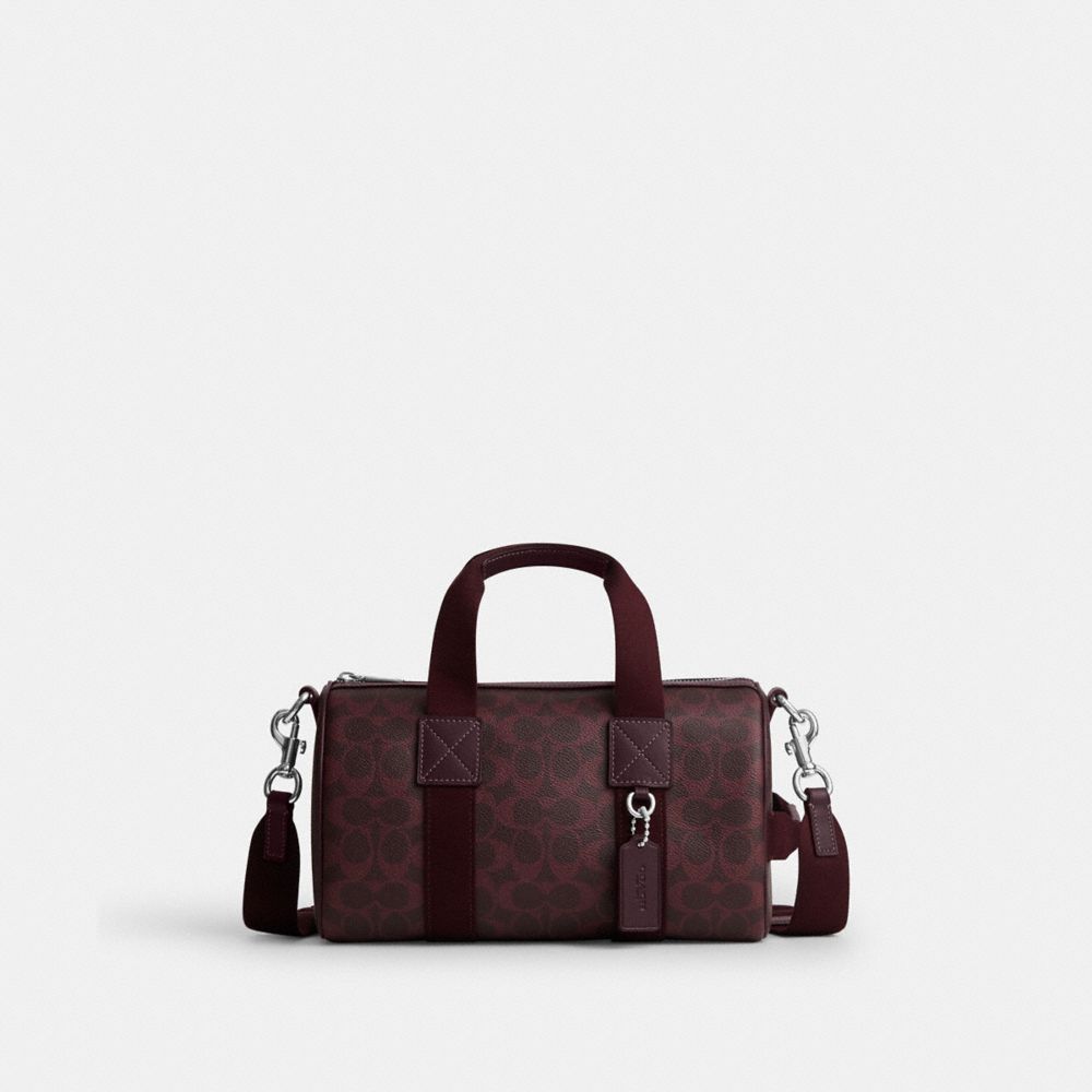 Coach Explorer Duffle Bag 28 In Signature Canvas Sv/Black Currant