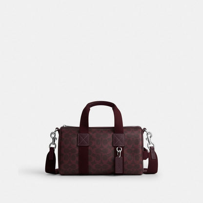 Coach Explorer Duffle Bag 28 In Signature Canvas Sv/Black Currant