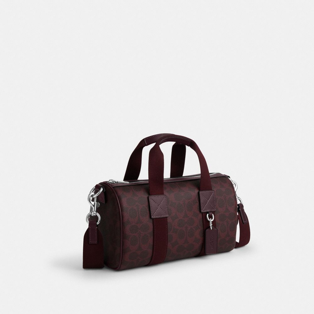 Coach Explorer Duffle Bag 28 In Signature Canvas Sv/Black Currant