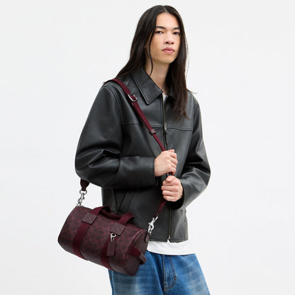 Coach Explorer Duffle Bag 28 In Signature Canvas Sv/Black Currant