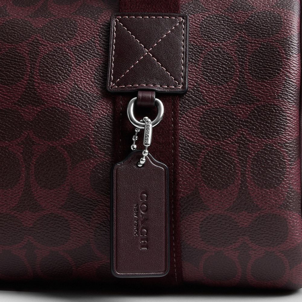 Coach Explorer Duffle Bag 28 In Signature Canvas Sv/Black Currant