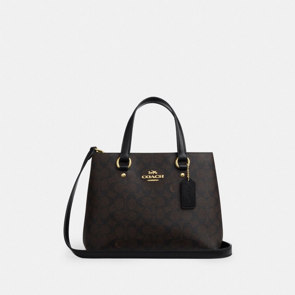 Coach Station Carryall Bag In Signature Canvas Gold Walnut Black
