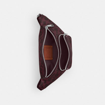 Coach Travis Belt Bag 30 In Signature Canvas Sv/Black Currant
