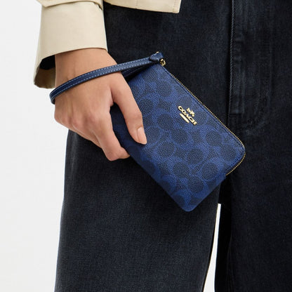 Coach Corner Zip Wristlet In Signature Canvas Gold/Navy