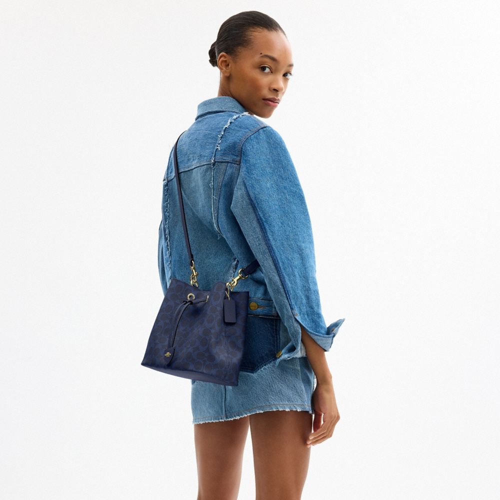 Coach Rowan Bucket Bag In Signature Canvas Gold/Navy