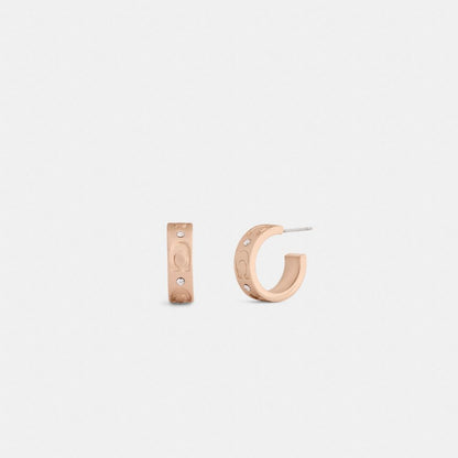 Coach Repeated C Huggie Earrings Rose Gold