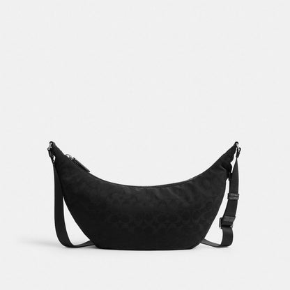 Coach Leon Sling Bag In Signature Nylon Jacquard Black