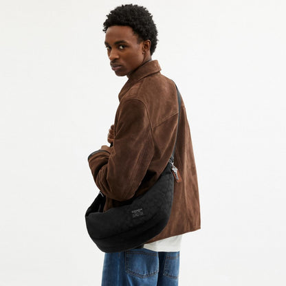 Coach Leon Sling Bag In Signature Nylon Jacquard Black