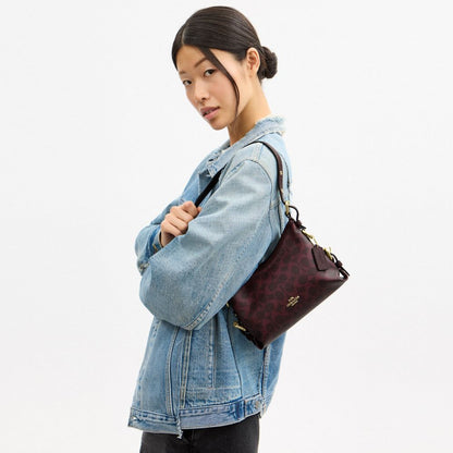 Coach Laurel Shoulder Bag 22 With Buckles In Signature Canvas Gold/Black Currant