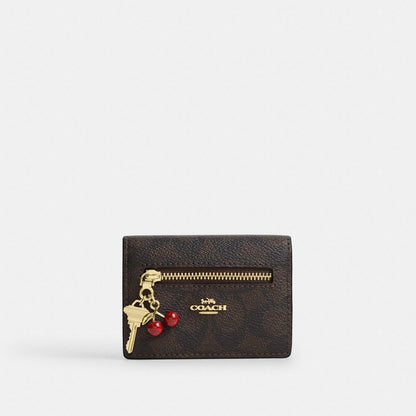 Coach Card Case With Charms In Signature Canvas Gold/Walnut/Black
