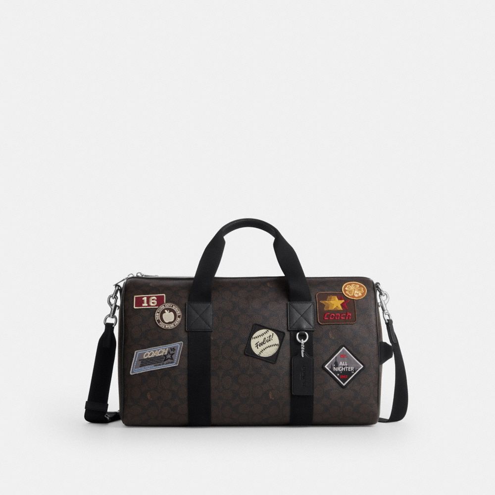 Coach Explorer Duffle Bag 45 In Signature Canvas With Patches Sv/Walnut/Black