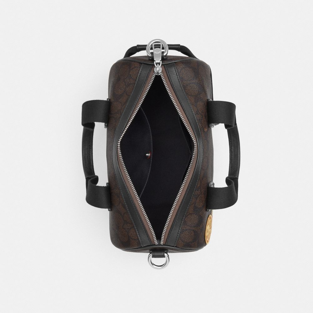 Coach Explorer Duffle Bag 28 In Signature Canvas With Patches Sv/Walnut/Black