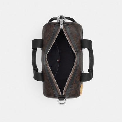 Coach Explorer Duffle Bag 28 In Signature Canvas With Patches Sv/Walnut/Black