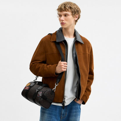 Coach Explorer Duffle Bag 28 In Signature Canvas With Patches Sv/Walnut/Black