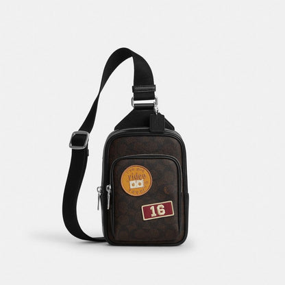 Coach Racer Sling Pack In Signature Canvas With Patches Sv/Walnut/Black