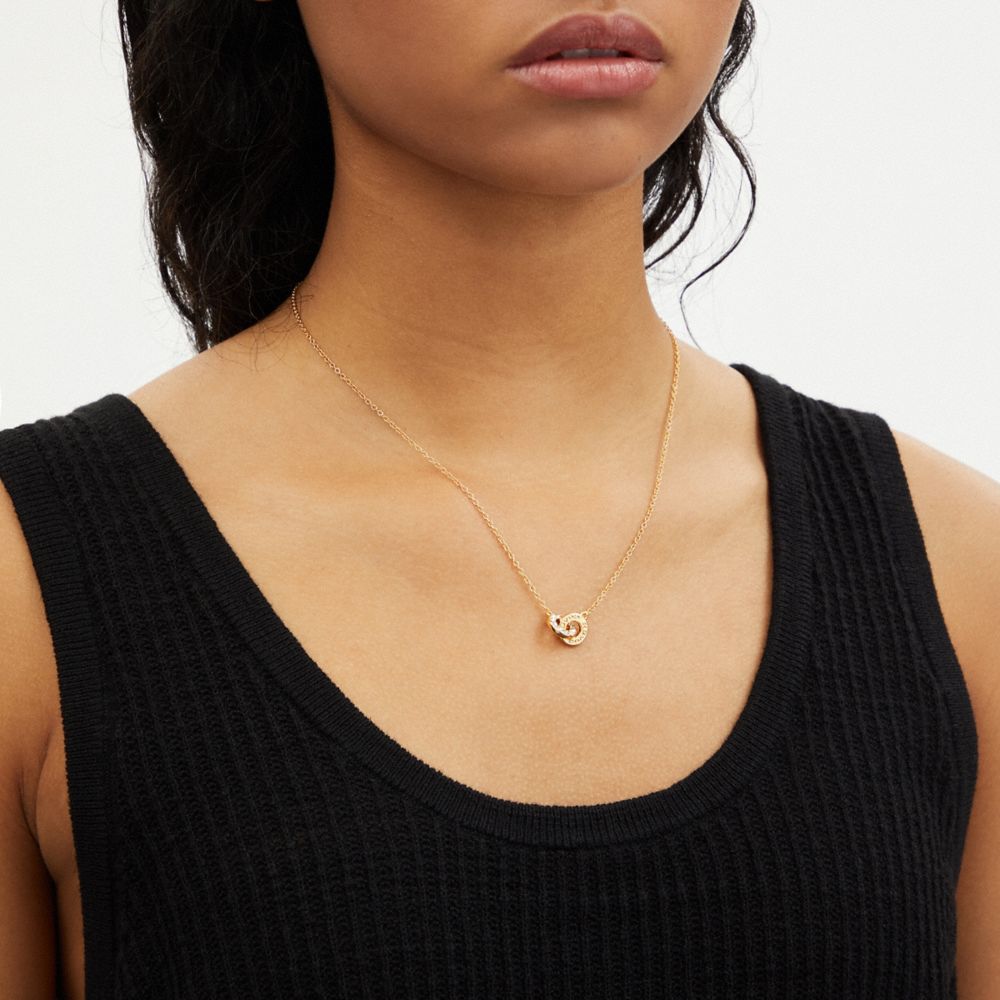 Coach Interlocking Open Circle Pearl Pendant Necklace Gold Pearl