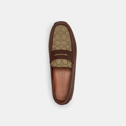 Coach Liam Driver In Signature Jacquard Dark Saddle