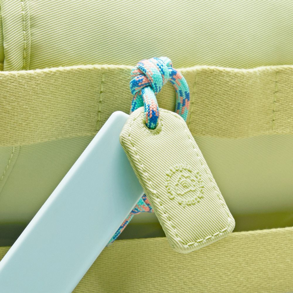 coachtopia mini backpack Coach Coachtopia Loop Mini Backpack Pale Lime – Kicks Machine