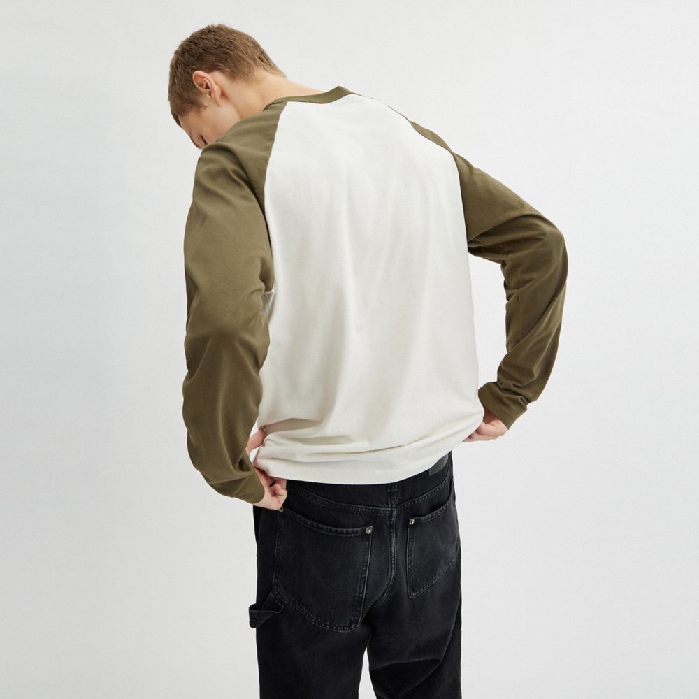 Coach Wild Raglan Crewneck Long Sleeve T Shirt In Organic Cotton Cream Multicolor
