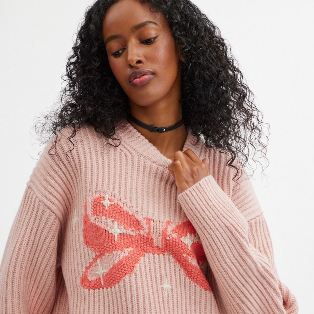 Coach Crewneck Bow Sweater In Recycled Wool Pink