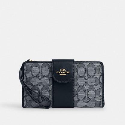 Coach Phone Wallet In Signature Jacquard Gold Navy Midnight Navy