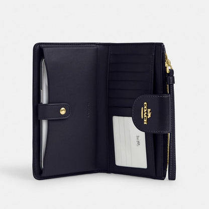 Coach Phone Wallet In Signature Jacquard Gold Navy Midnight Navy