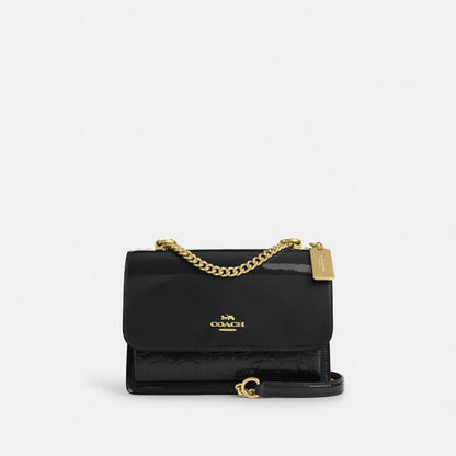 Klare Crossbody Bag In Signature Leather Novelty Leather-Gold-Black Novelty Leather-Gold-Black