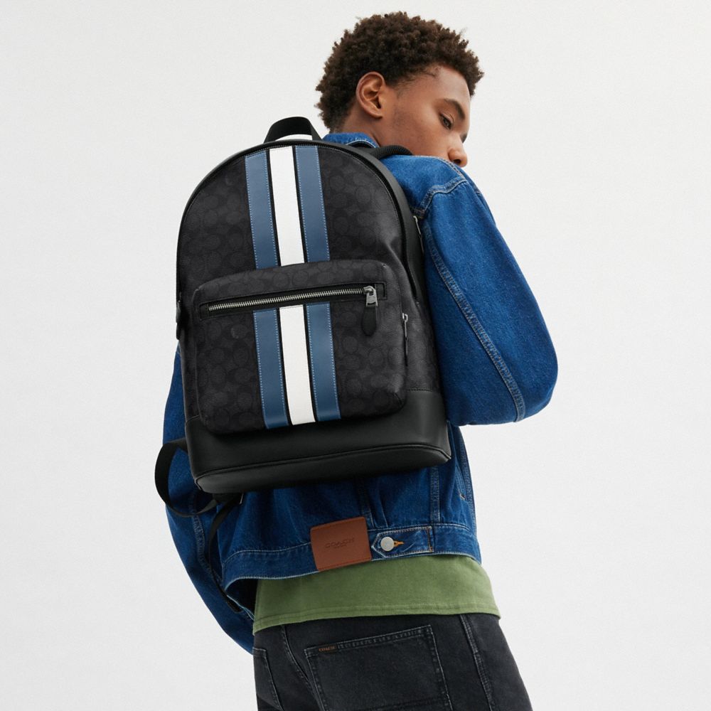 West Backpack In Signature Canvas With Varsity Stripe Signature Canvas-Gunmetal-Charcoal-Denim-Chalk Signature Canvas-Gunmetal-Charcoal-Denim-Chalk