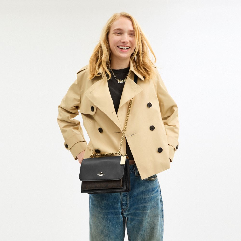 Coach Klare Crossbody Bag In Signature Canvas Gold Walnut Black