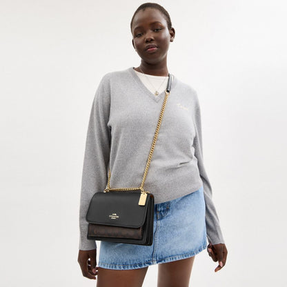 Coach Klare Crossbody Bag In Signature Canvas Gold Walnut Black