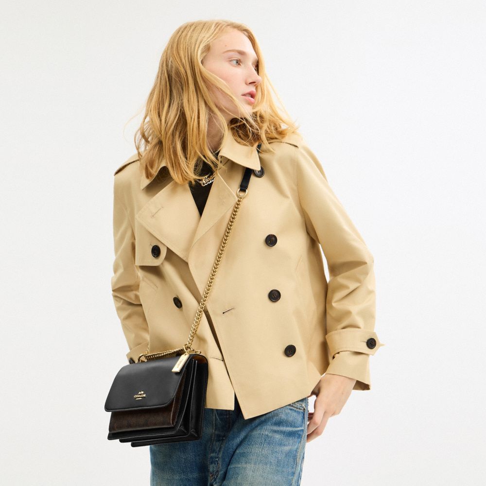 Coach Klare Crossbody Bag In Signature Canvas Gold Walnut Black