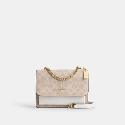 Coach Mini Klare Crossbody Bag In Signature Canvas Gold Sand Chalk