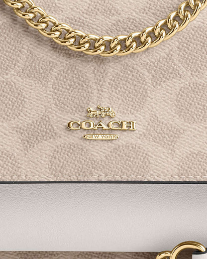 Mini Klare Crossbody Bag In Signature Canvas Signature Canvas-Gold-Sand-Chalk Signature Canvas-Gold-Sand-Chalk