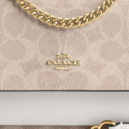 Coach Mini Klare Crossbody Bag In Signature Canvas Gold Sand Chalk