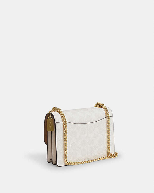 Mini Klare Crossbody Bag In Signature Canvas Signature Canvas-Gold-White-Chalk Signature Canvas-Gold-White-Chalk