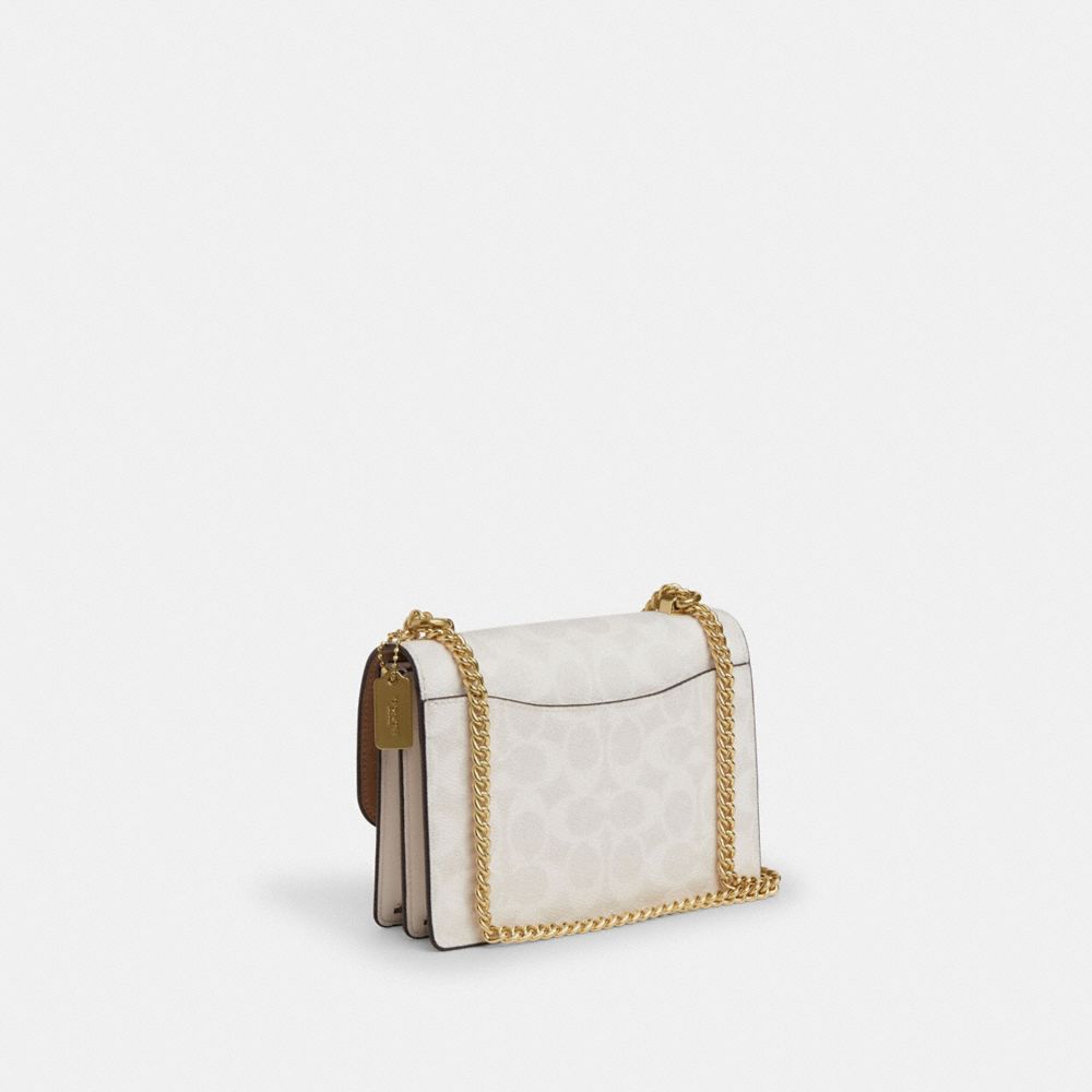 Coach Mini Klare Crossbody Bag In Signature Canvas Gold White Chalk